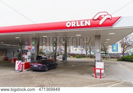 Poznan, Poland - February 11, 2023: Refueling Cars At A Gas Station In The City.