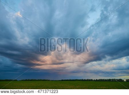 Gloomy Storm Clouds Over A Wheat Field, Rainy Summer
