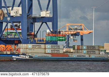 Rotterdam, The Netherlands - Circa 2019: Cargo Containers Loaded On Ships By Cranes In The Euromax C