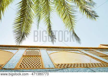 Shiraz, Iran - June 6th, 2022: Khan School.persian Courtyard With Green Garden At Madrese E-khan. Th