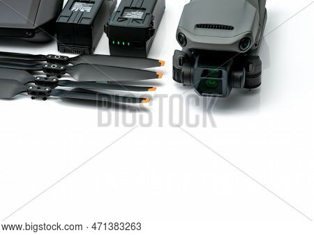 Drone And Propeller Blades On Blur Drone Lipo Rechargeable Battery. Uav Or Unmanned Aerial Vehicle. 