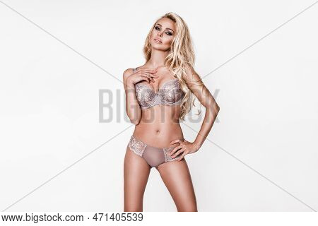 Sexy Girl In Elegant Lingerie Isolated On White Background. Lingerie Model Concept.