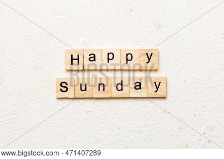 Hello Sunday Word Written On Wood Block. Hello Sunday Text On Cement Table For Your Desing, Concept.