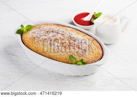 Freshly Prepared Mannik, Semolina Pie In The Form Sprinkled With Powdered Sugar With Sour Cream And 