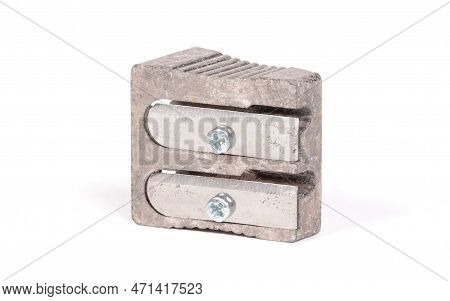 Old Manual Metal Pencil Sharpner On White Background