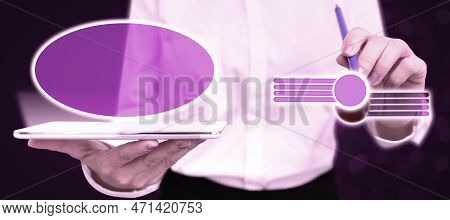 Lady In Office Suit Holding Tablet And Pen. Pointing On Fufturistic Element On Screen. Image With Co