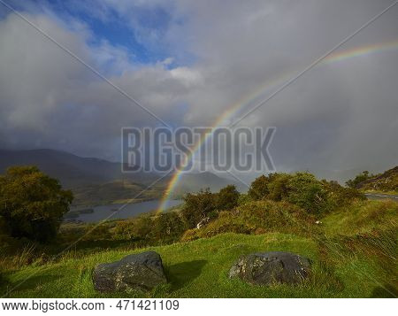 Rainbow Over The Kenmare Road In The Glengarriff National Park In Ireland.