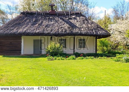 Ancient Traditional Ukrainian Rural House  In Open Air Museum Of Folk Architecture And Folkways Of M