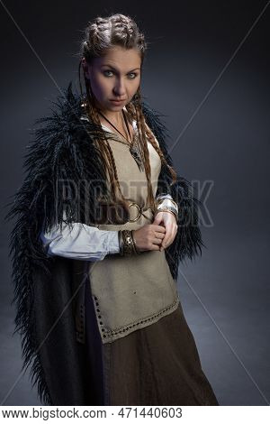 An Authoritative, Self-confident Woman In A Viking-style Fantasy Costume. Skirt With Shirt And Long 