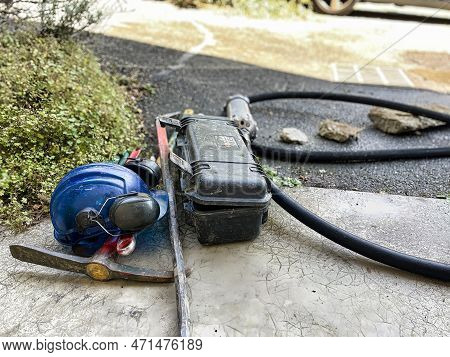 Menthon Saint Bernard, France - September 07 2021: A Professional Worker Is Busy With A Pump Car And