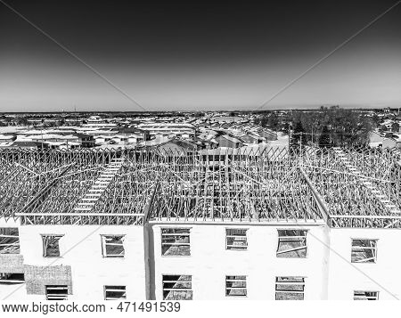 Aerial Drone View Of A Multifamily Apartment Complex Under Construction.