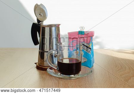 February 24, 2023. Sumy, Ukraine. Italian Geyser Coffee Maker And An Open Pack Of Coffee With The In