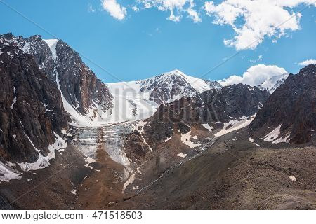 Scenic Mountain Landscape With Vertical Glacier And Sunlit Snow Mountains In Sunny Day. Beautiful Al