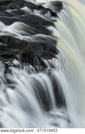 Beautiful Peaceful Landscape Image Of Aysgarth Falls In Yorkshire Dales In England During Winter Mor