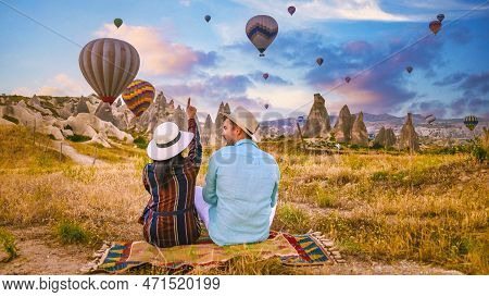 Cappadocia Turkey During Sunrise, Couple On Vacation In The Hills Of Goreme Capadocia Turkey