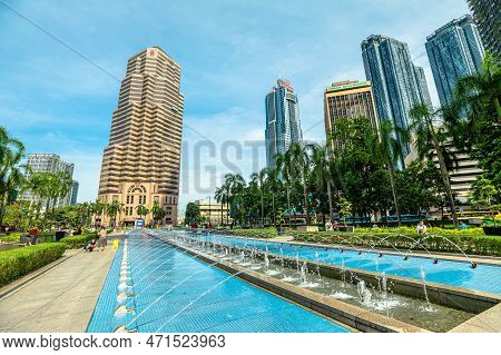 Kuala Lumpur, Malaysia - January 2023: Public Bank Berhad In Front Of Petronas Twin Towers Stunning 