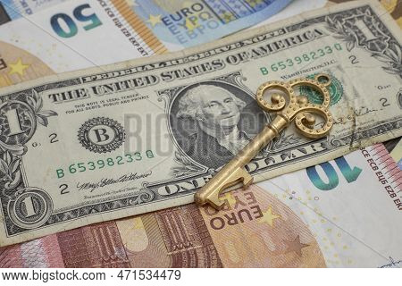 Money Opens Many Doors. Ancient Key On Banknotes