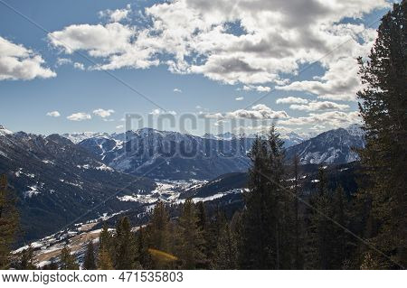 View Over The Beautiful Snow-covered Fassa Valley In The Dolomites From The Rosengarten Ski Area Wit