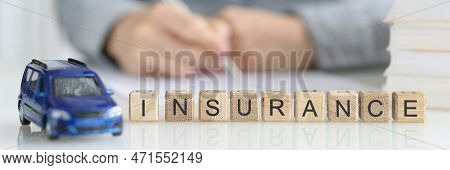 Sales Representative Fills Out Contractual Documents For Car Insurance. Sales Rental Cars Concept