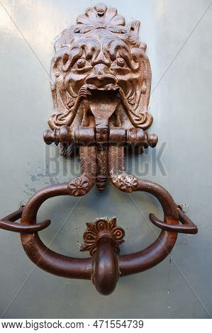 European Vintage Old Metal Wrought Iron Door Knocker. Design Detail. Paris.