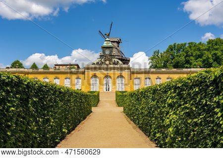 New Chambers (neue Kammern) Palace And Windmill (windmuhle) In  Sanssouci Park In Spring, Potsdam, G