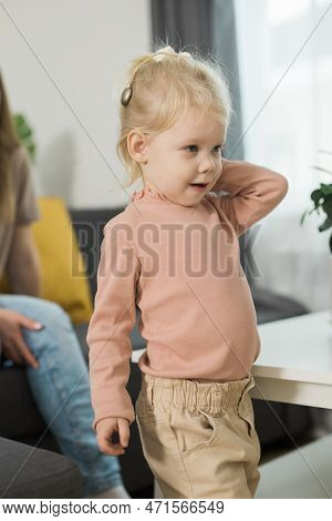 Cochlear Implant System. Installation Cochlear Implant On Child Girl Ear For Restores Hearing. Kid H