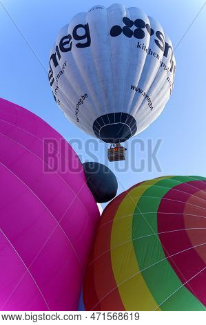 Balloons Rising Up In The Air. Taken At 42nd International Balloon Festival In Chateau D'oex In Janu