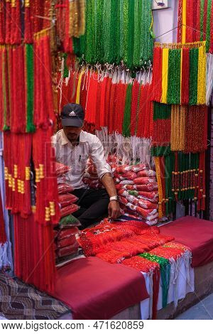 Kathmandu, Nepal, 04 23 2022: A Man Sitting In His Webbing Booth In Kathmandu