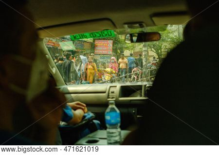 Kathmandu, Nepal, 04 23 2022: View On Crowds Out Of A Car In Kathmandu