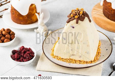 Traditional Cottage Cheese Easter Paskha And Eggs On White Table. Russian Paskha. Easter Dessert. Ea