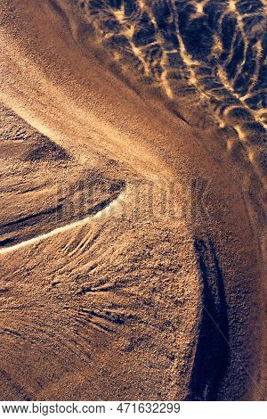 Sand Textures In The Beach. Nigran, Galicia, Spain