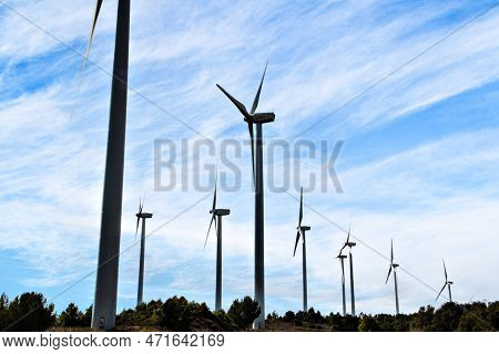 Windmills For The Production Of Electrical Energy. Wind Farm Of Renewable, Alternative And Sustainab