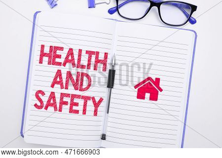 Hand Writing Sign Health And Safety. Conceptual Photo Taking The Appropriate Steps To Protect Yourse
