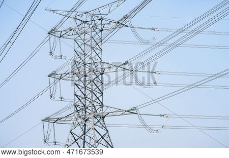 High Voltage Electric Transmission Tower. High Voltage Power Lines Against The Sky. Electricity Pylo