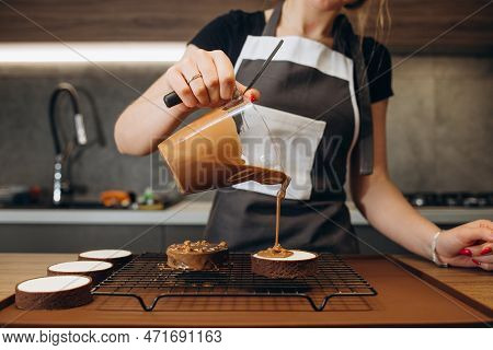Beautiful Young Chef Decorating Delicious Dessert