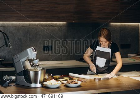 Pastry Chef Makes Muffins And Pours Dough Into Molds
