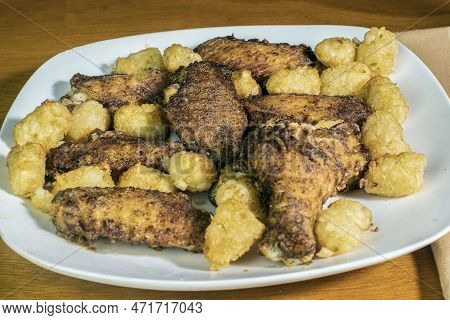 Plate Full Chicken Wings Served With  Tater Tots