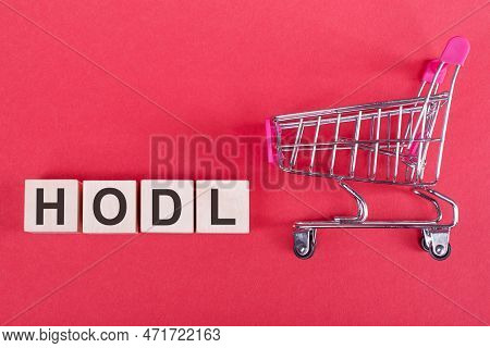 On A Red Background Wooden Cubes Build The Inscription - Hodl
