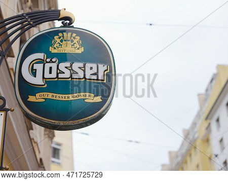Salzburg, Austria - August 6, 2022: Facades Of Buildings With Sign O Gosser Is An Austrian Beer Bran