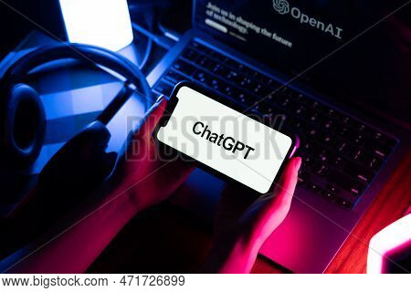 Illustrative Editorial Of Chatgpt Symbol On Smartphone Screen In Female Hands. Chat Gpt Is An Ai Cha