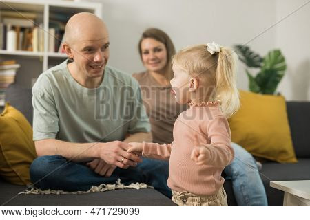 Cochlear Implant System. Installation Cochlear Implant On Child Girl Ear For Restores Hearing. Kid H