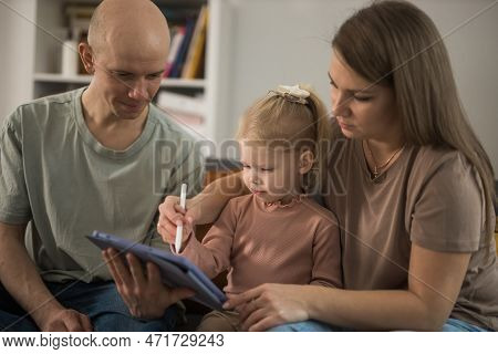Cochlear Implant System. Installation Cochlear Implant On Child Girl Ear For Restores Hearing. Kid H