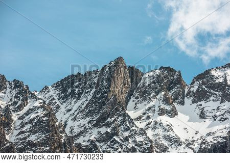 Scenic Alpine Landscape With Snowy Mountain Peak In Sunny Day. Awesome Landscape With Rocky Pinnacle