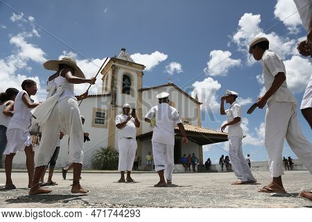 Salvador, Bahia, Brazil - January 1, 2023: Members Of Candombles Make Offerings On The Beach In Umai