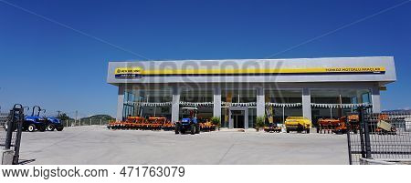 Araclar, Turkey - September 16, 2022: New Holland Agriculture Logo In The Dealership Store Against A