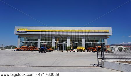Araclar, Turkey - September 16, 2022: New Holland Agriculture Logo In The Dealership Store Against A