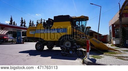 Araclar, Turkey - September 16, 2022: New Holland Agriculture Logo In The Dealership Store Against A