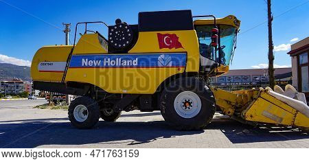 Araclar, Turkey - September 16, 2022: New Holland Agriculture Logo In The Dealership Store Against A