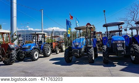 Araclar, Turkey - September 16, 2022: New Holland Agriculture Logo On Tractor In The Dealership Stor