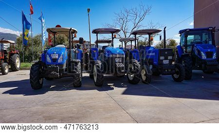 Araclar, Turkey - September 16, 2022: New Holland Agriculture Logo On Tractor In The Dealership Stor
